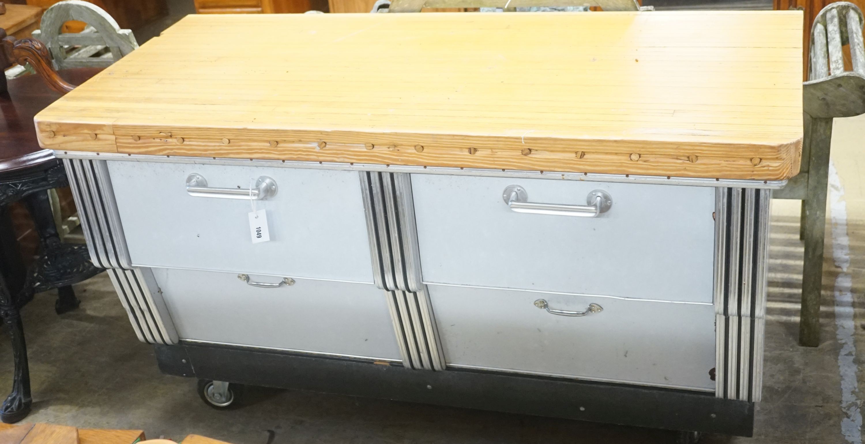 A mid 20th century shop counter cabinet with pine strip work top, width 152cm depth 71cm height 88cm